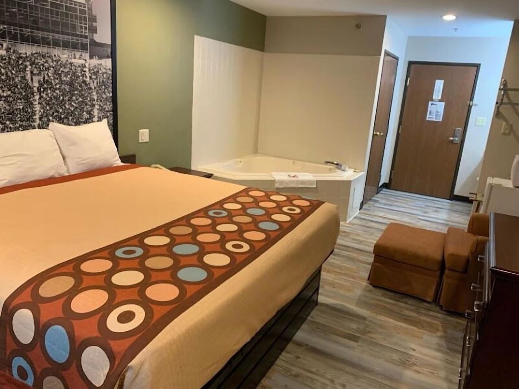 Desk, laptop workspace, blackout drapes, iron/ironing board