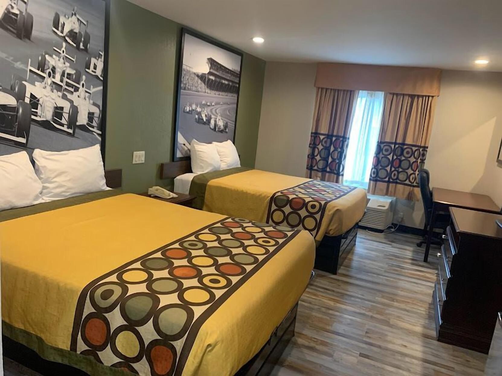 Desk, laptop workspace, blackout drapes, iron/ironing board