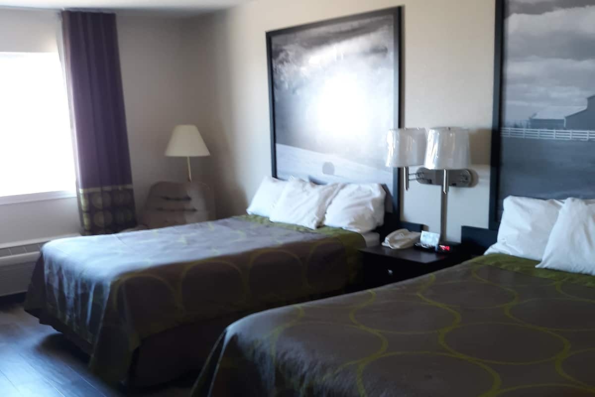 Desk, blackout drapes, iron/ironing board, rollaway beds