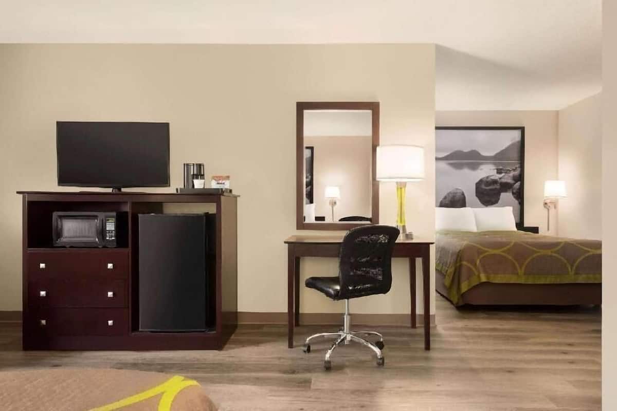 Desk, blackout drapes, iron/ironing board, rollaway beds