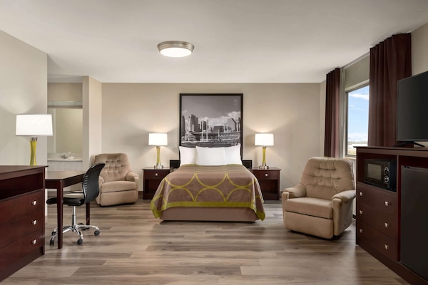 Desk, blackout curtains, iron/ironing board, rollaway beds