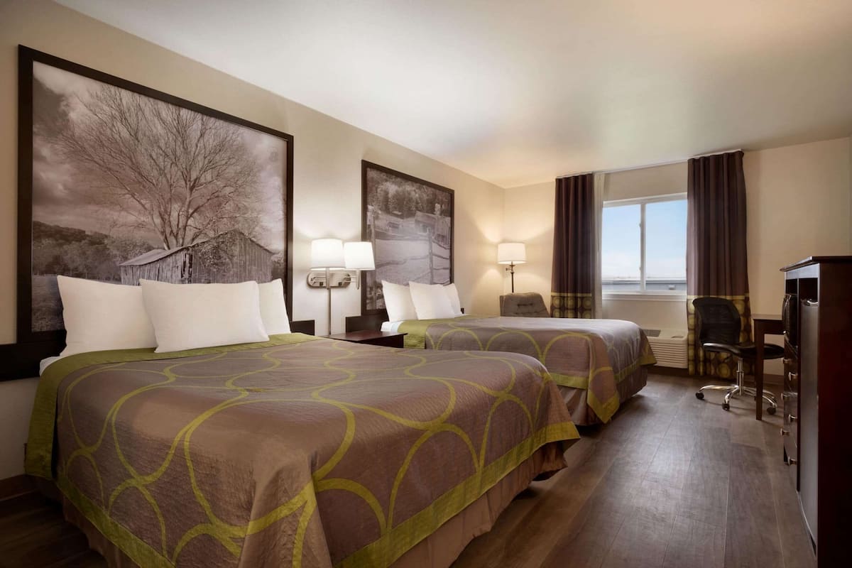 Desk, blackout drapes, iron/ironing board, rollaway beds