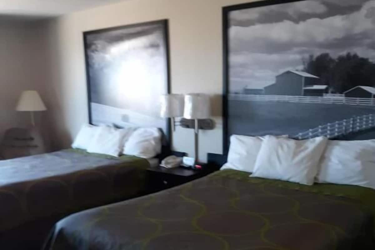 Desk, blackout drapes, iron/ironing board, rollaway beds