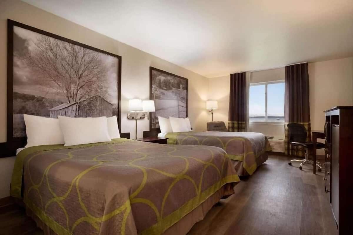 Desk, blackout drapes, iron/ironing board, rollaway beds