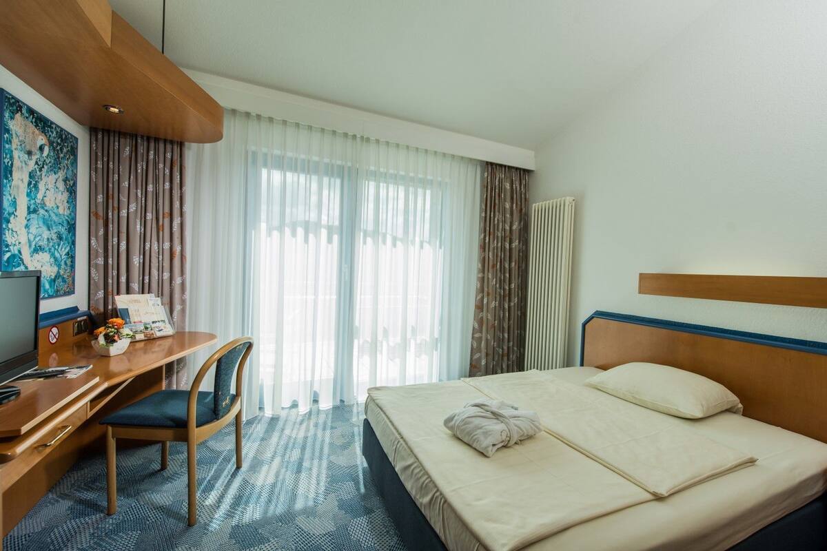 In-room safe, desk, rollaway beds (surcharge), WiFi (free)