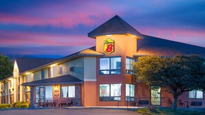 A Super 8 hotel with a modern design, featuring a prominent 'Super 8' sign on the building.