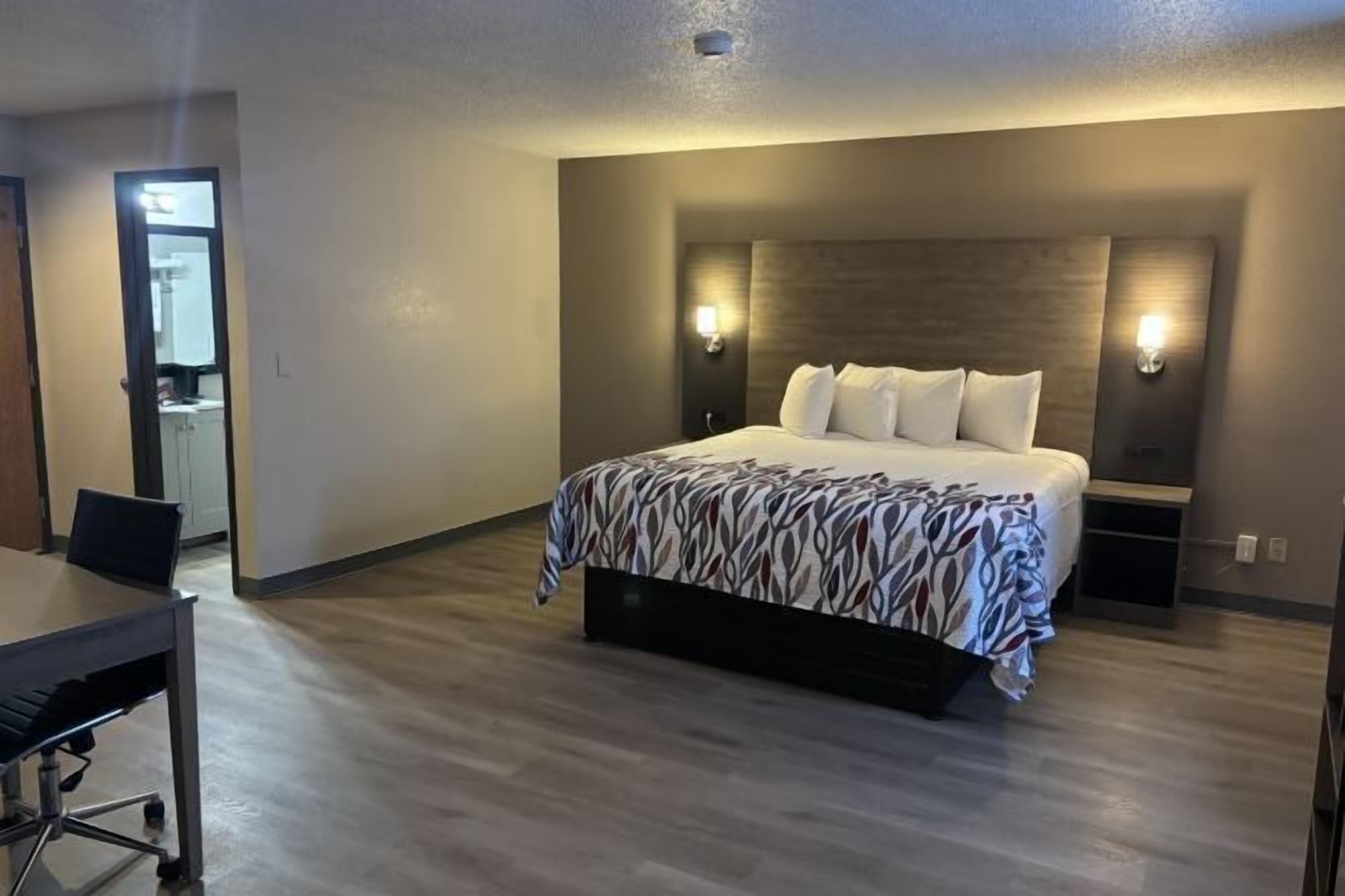 Desk, laptop workspace, blackout curtains, iron/ironing board