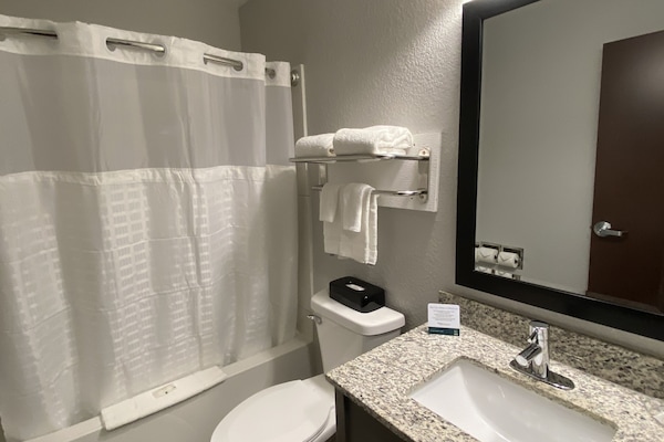 Combined shower/tub, hair dryer, towels, soap