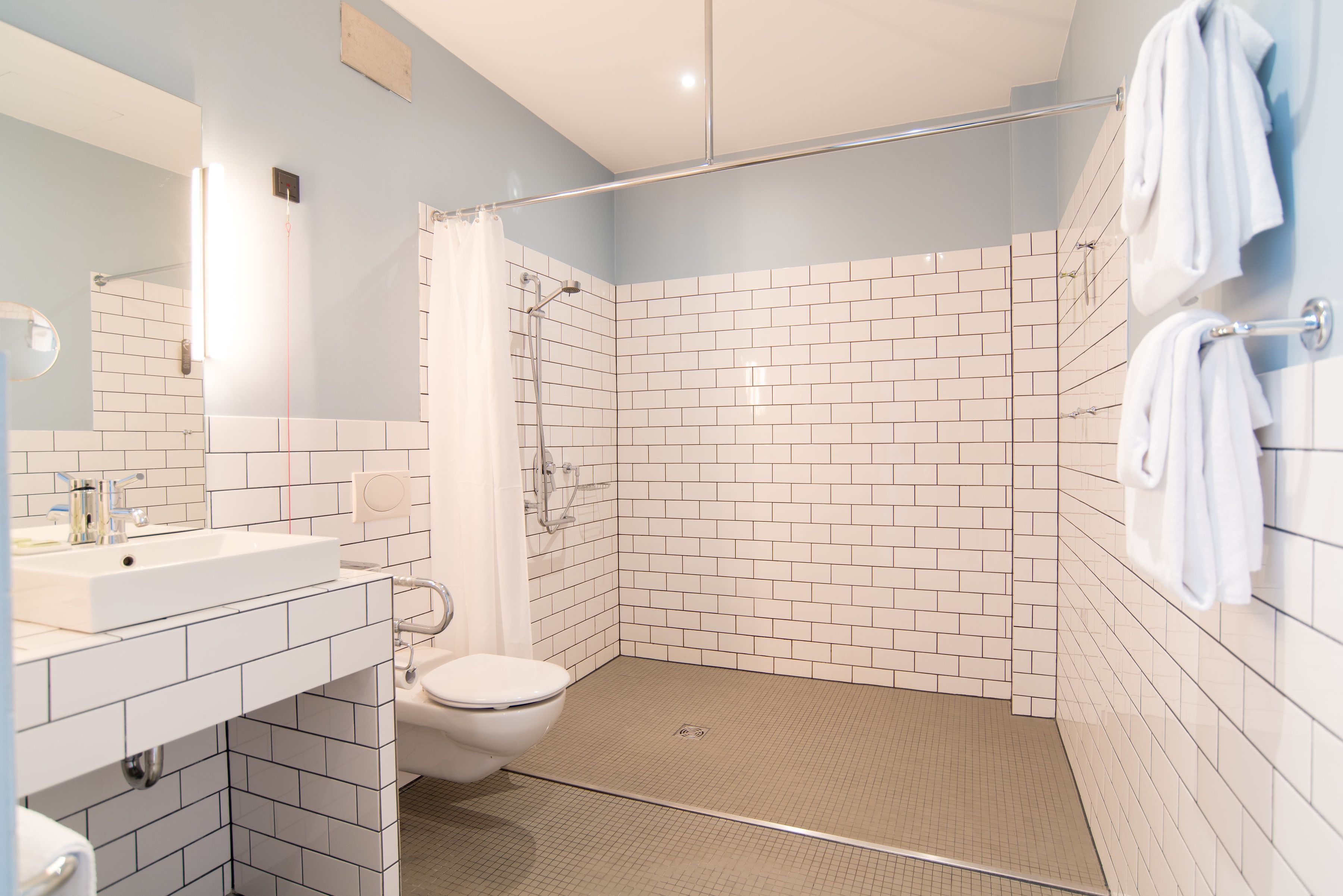 accessible double room | bathroom | shower, free toiletries, hair dryer, towels