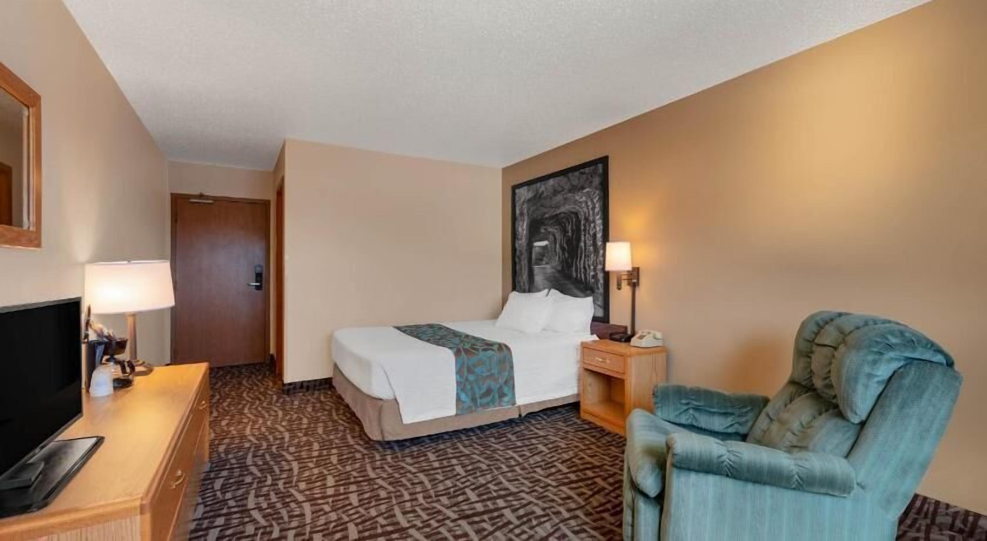 Desk, blackout curtains, iron/ironing board, rollaway beds
