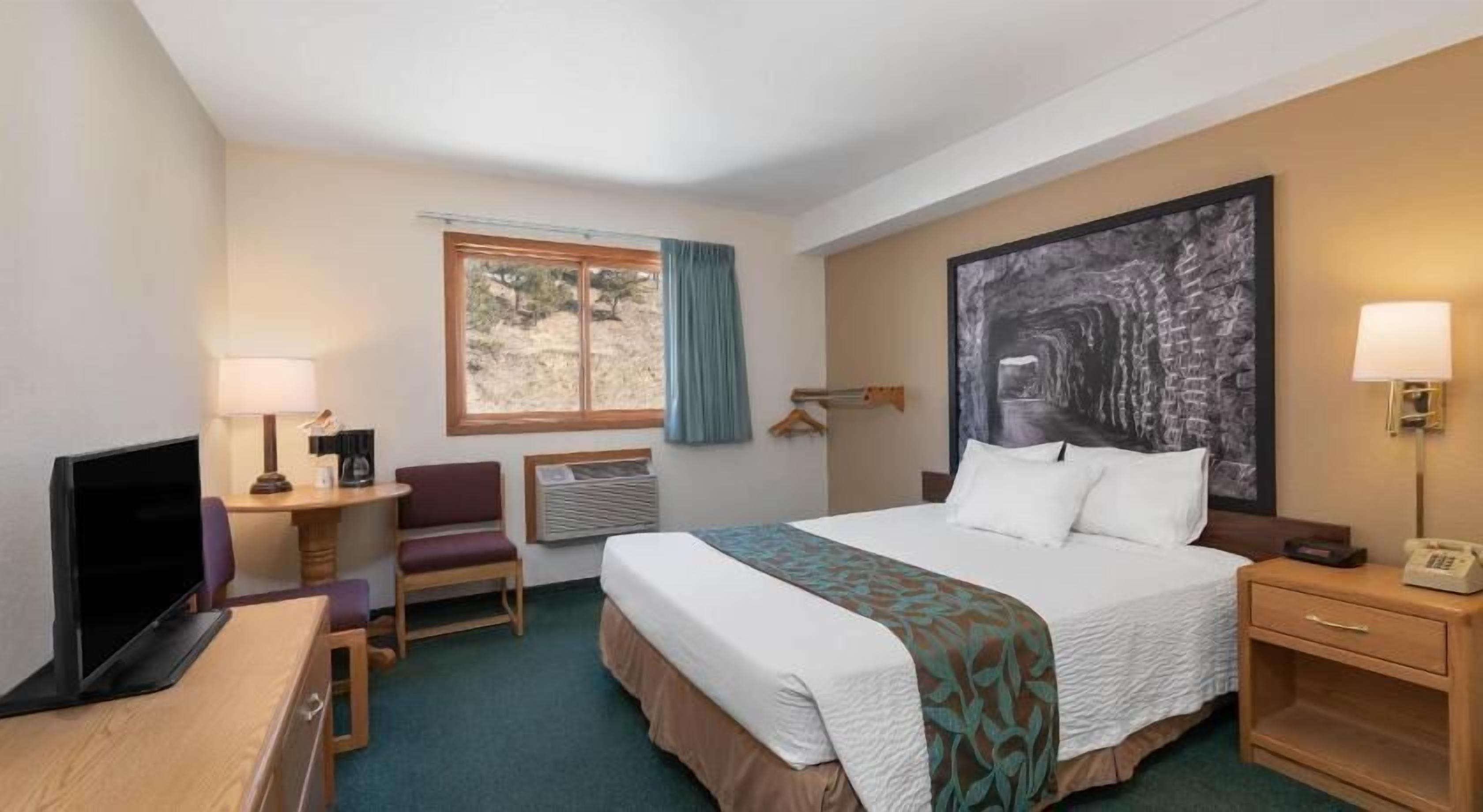 Desk, blackout curtains, iron/ironing board, rollaway beds