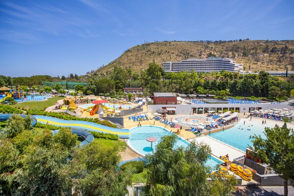 Seasonal outdoor pool, pool umbrellas, sun loungers