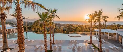 Seasonal outdoor pool, pool umbrellas, sun loungers