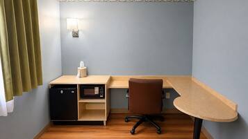 Desk, laptop workspace, free WiFi, bed sheets
