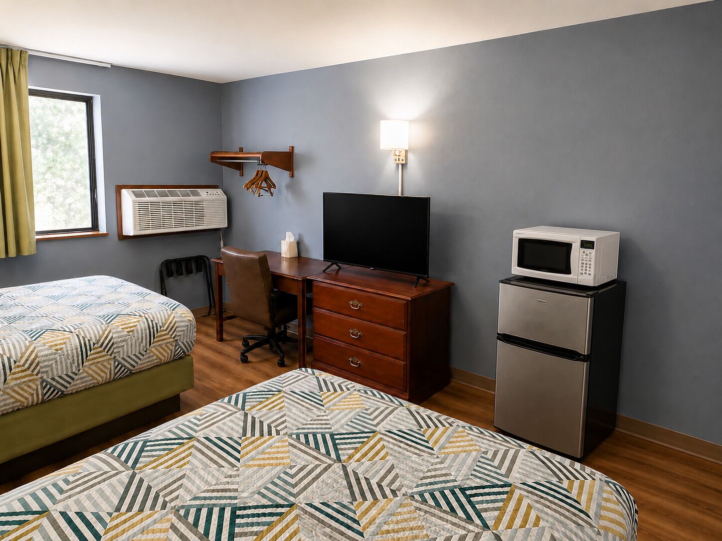 Desk, laptop workspace, free WiFi, bed sheets