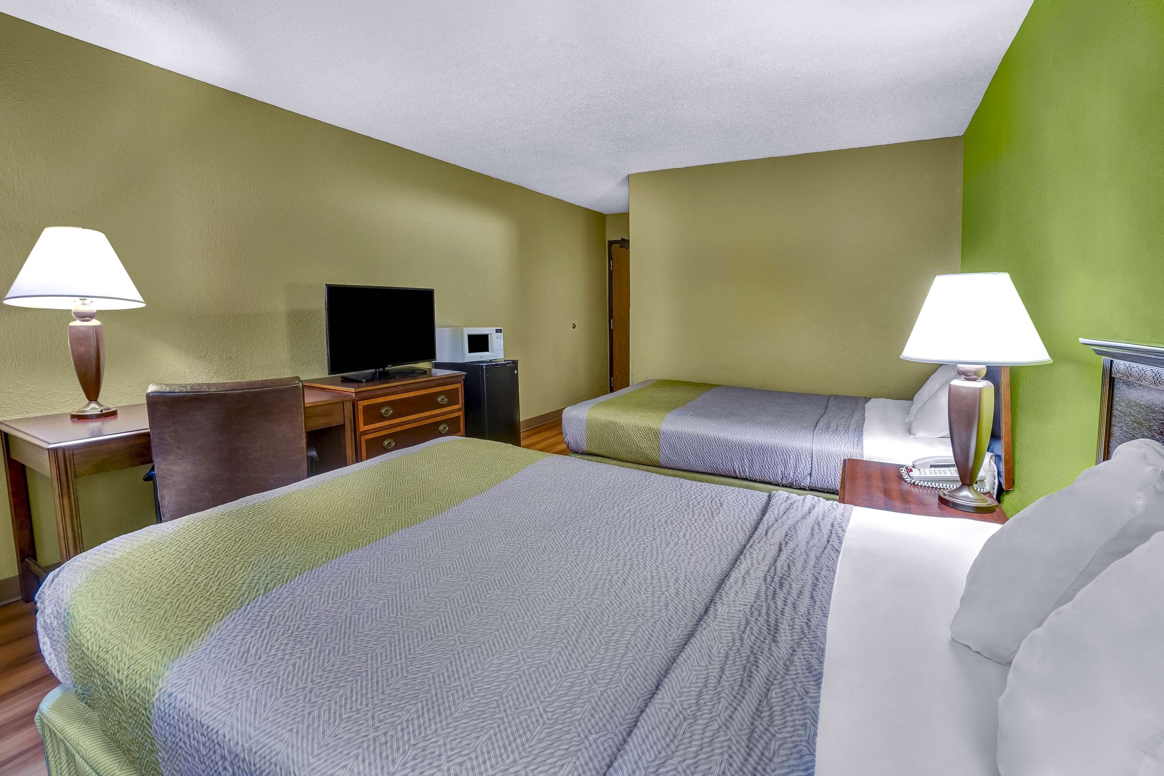 Desk, laptop workspace, free WiFi, bed sheets