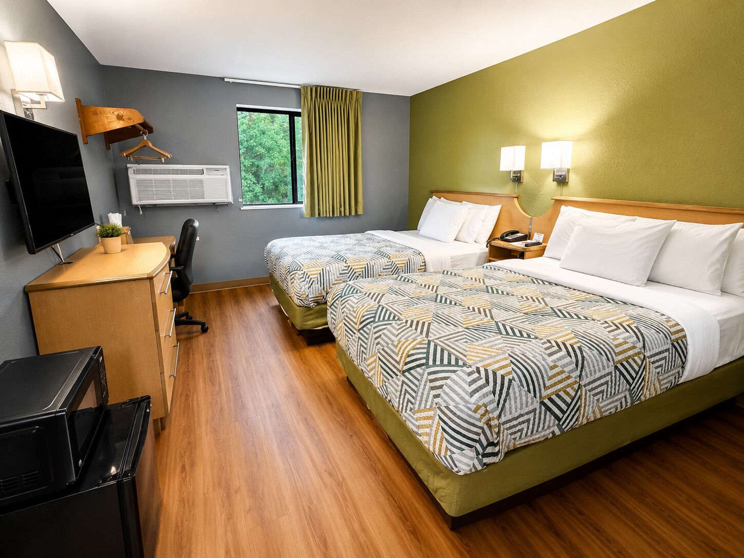 Desk, laptop workspace, free WiFi, bed sheets