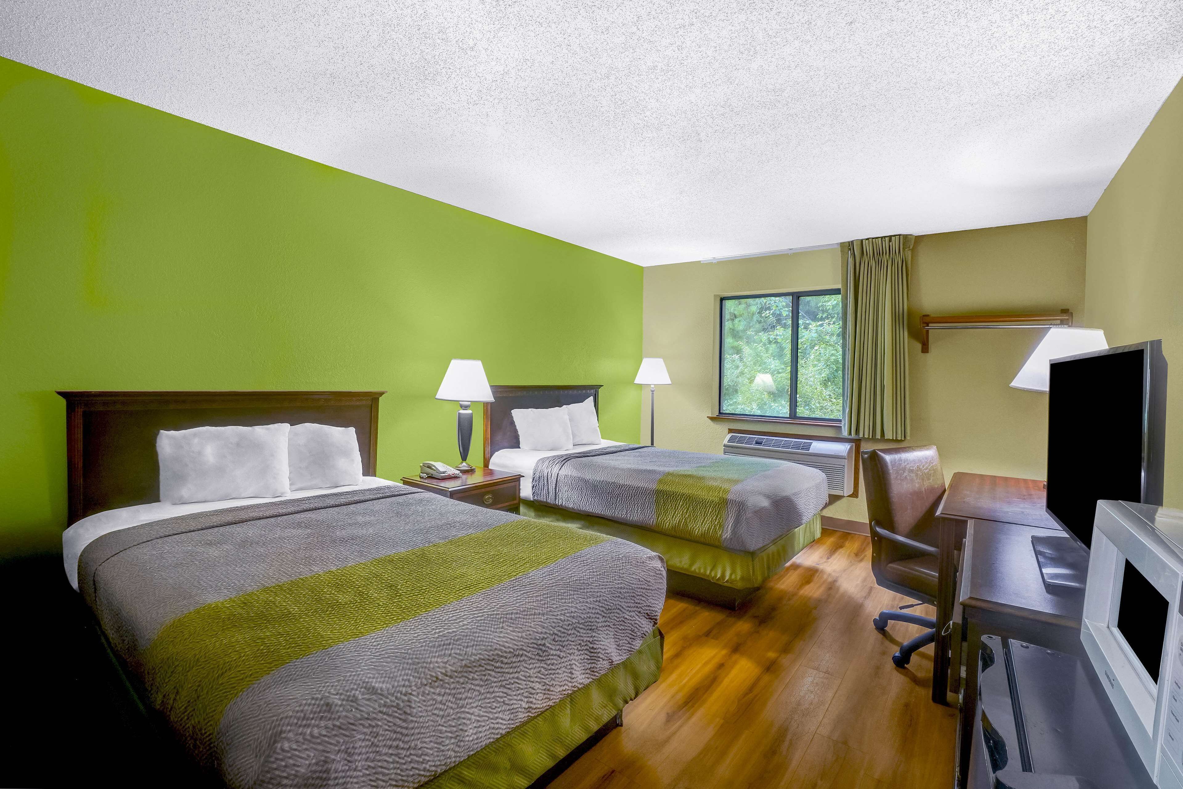 Desk, laptop workspace, free WiFi, bed sheets