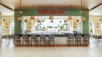 8 bars/lounges, swim-up bar, poolside bar