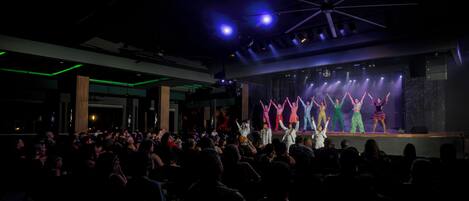 A theater with a stage and audience.
