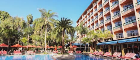 Outdoor pool, pool umbrellas, pool loungers