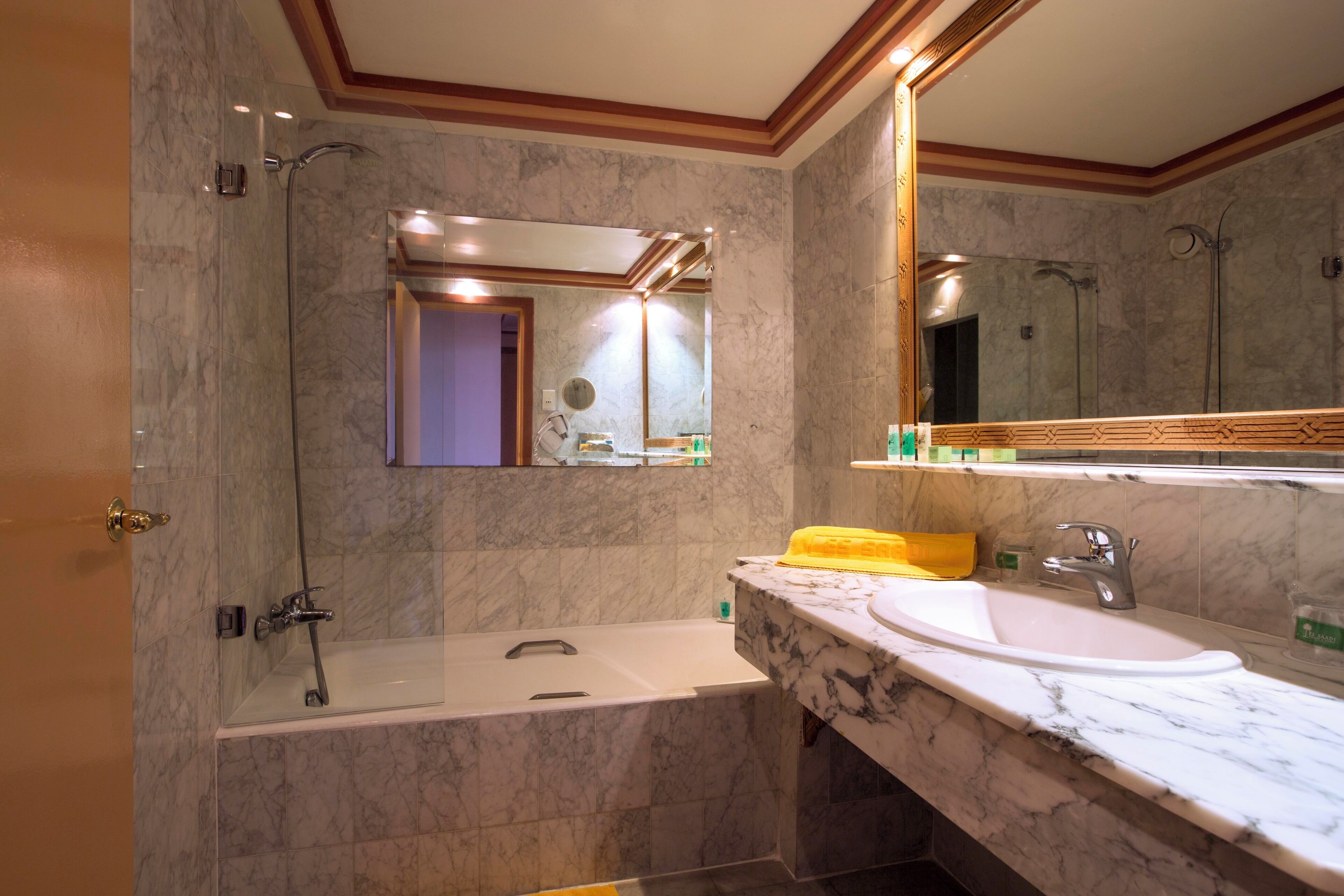 combined shower/bathtub, free toiletries, hair dryer, bathrobes