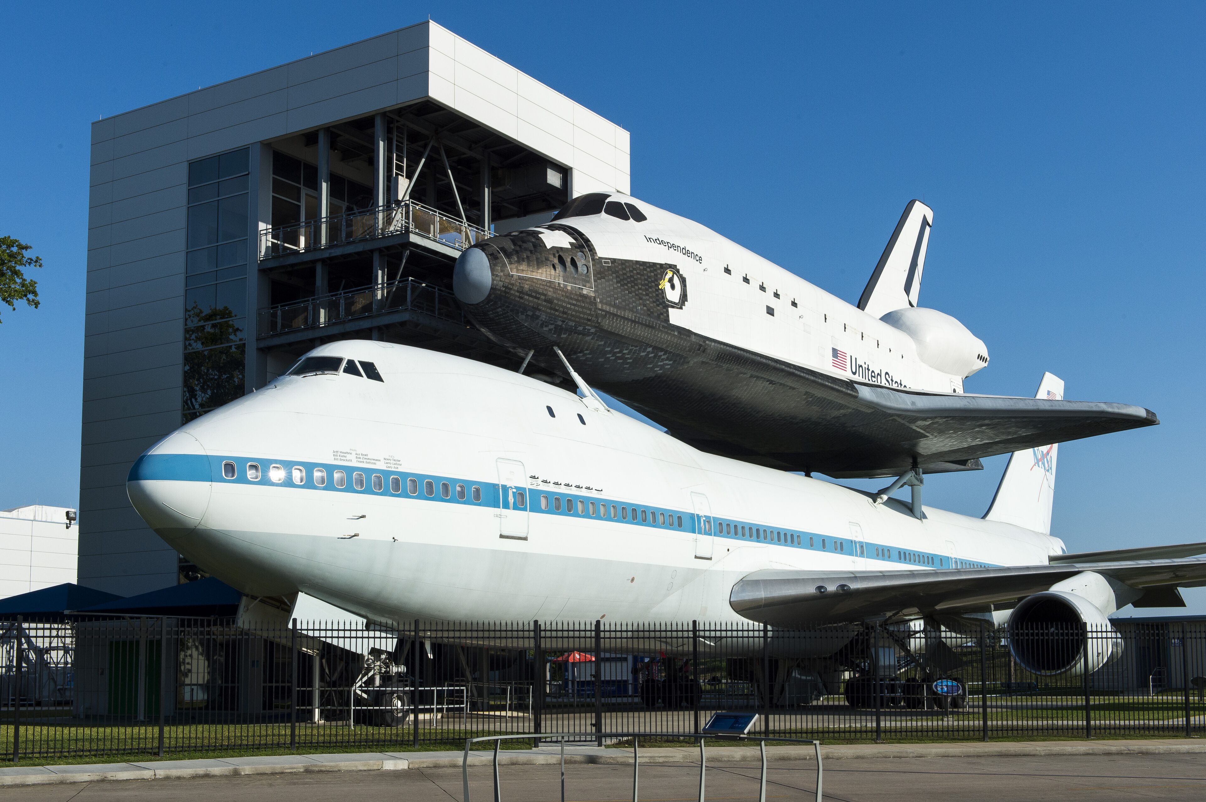 A space shuttle mounted on a large airplane.