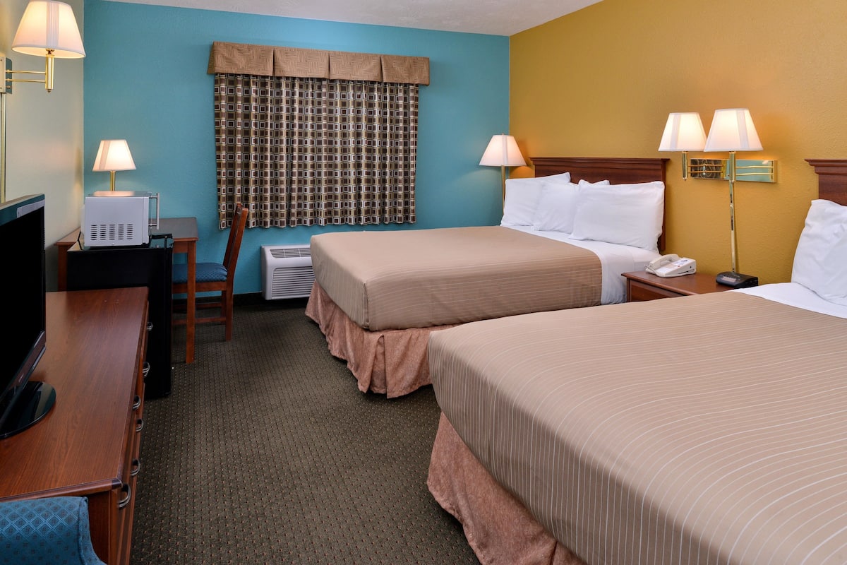 Room, 2 Queen Beds | Individually decorated, individually furnished, desk, blackout drapes