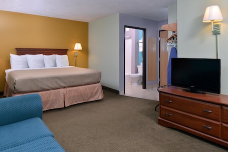 Room, 1 King Bed, Non Smoking | Individually decorated, individually furnished, desk, blackout curtains. Americas Best Value Inn Seymour
