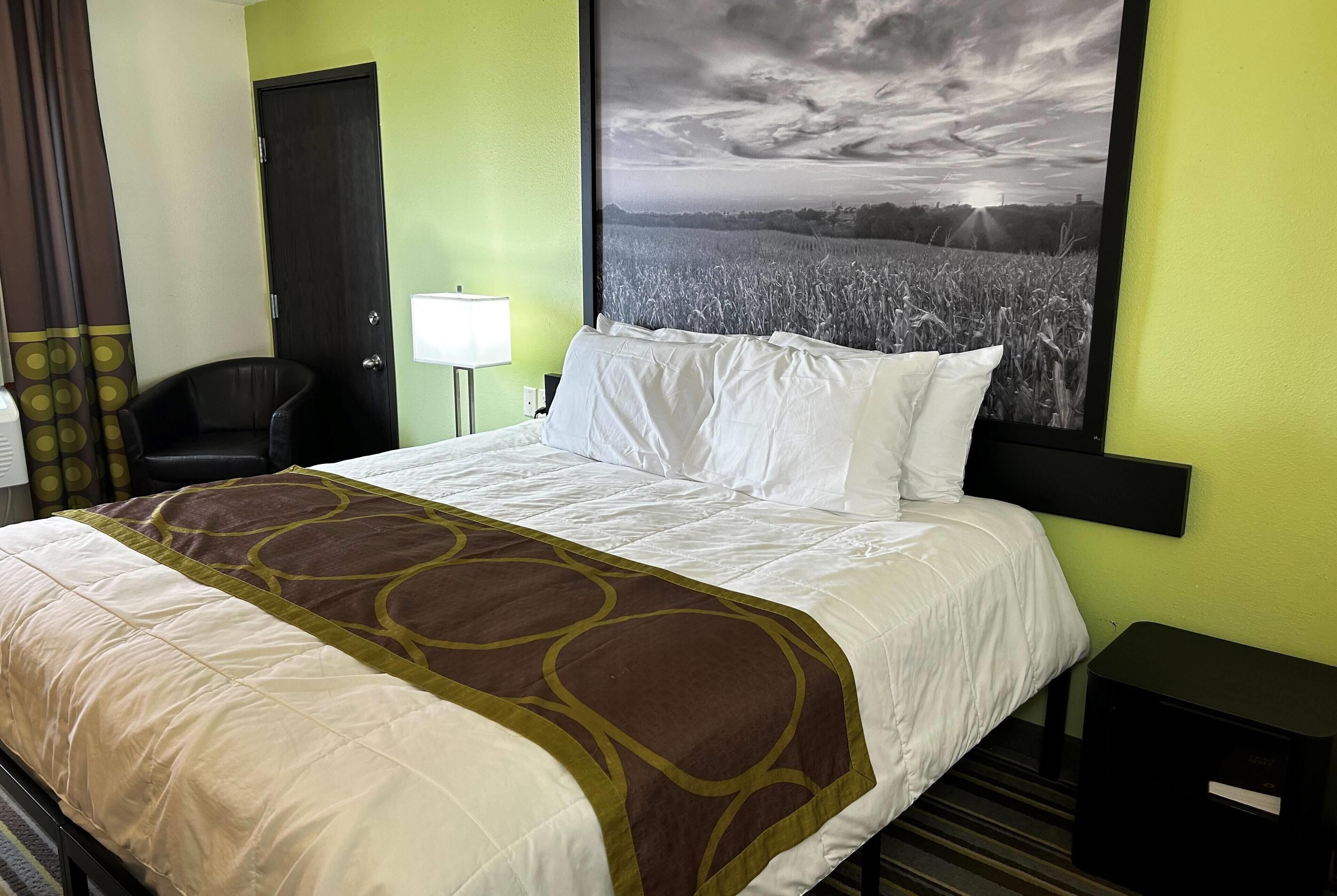 Premium bedding, desk, laptop workspace, soundproofing