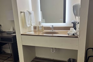 Combined shower/tub, deep soaking tub, free toiletries, hair dryer