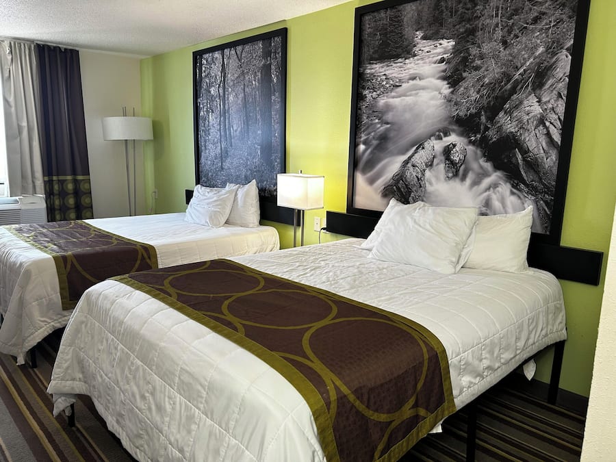 Premium bedding, desk, laptop workspace, soundproofing