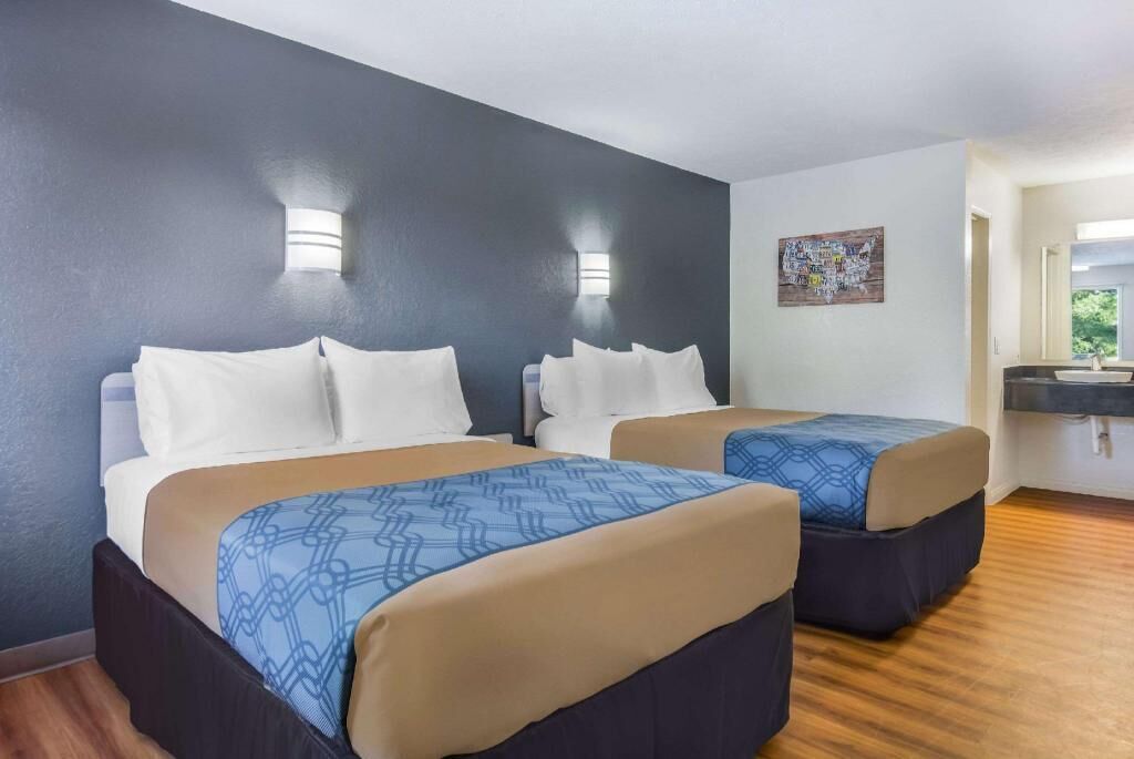 Desk, blackout curtains, free WiFi, bed sheets