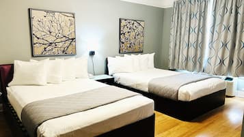 Room, 2 Double Beds | Individually decorated, individually furnished, desk, iron/ironing board