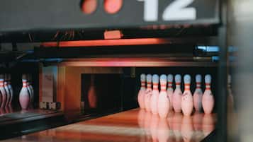 A bowling alley with a lane marked with the number 12.