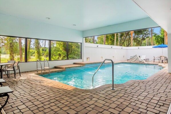 Outdoor pool, open 8 AM to 10 PM, pool umbrellas, sun loungers