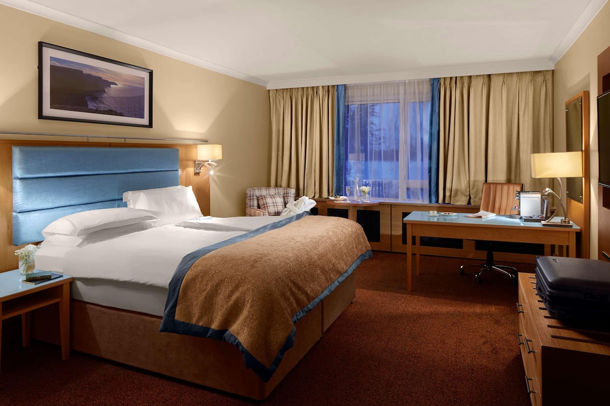 Ropa de cama de alta calidad y minibar