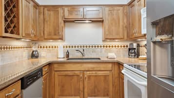 Standard Condo, 2 Bedrooms | Private kitchen | Fridge, microwave, stovetop, coffee/tea maker