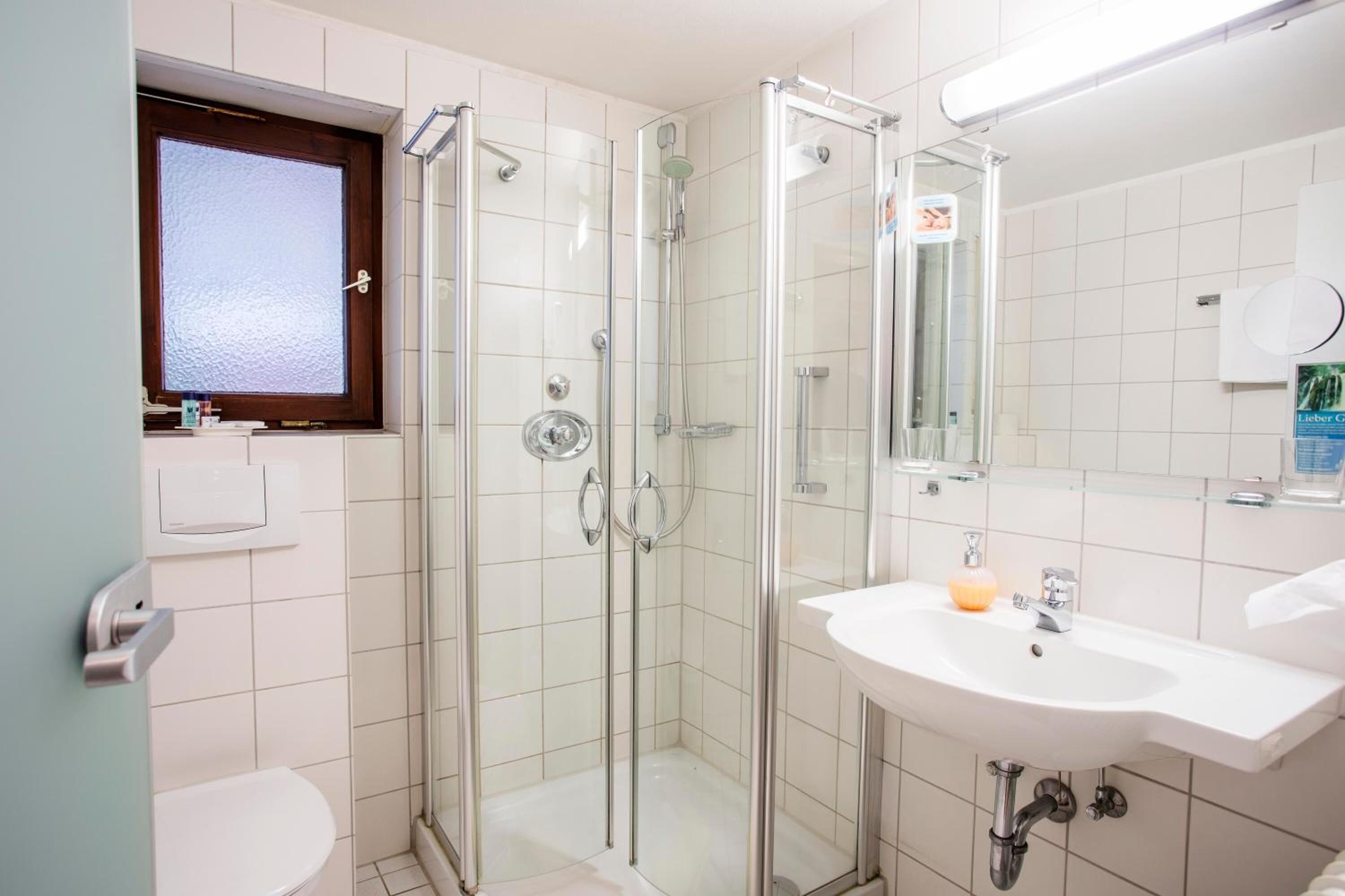 hair dryer, bathrobes, towels