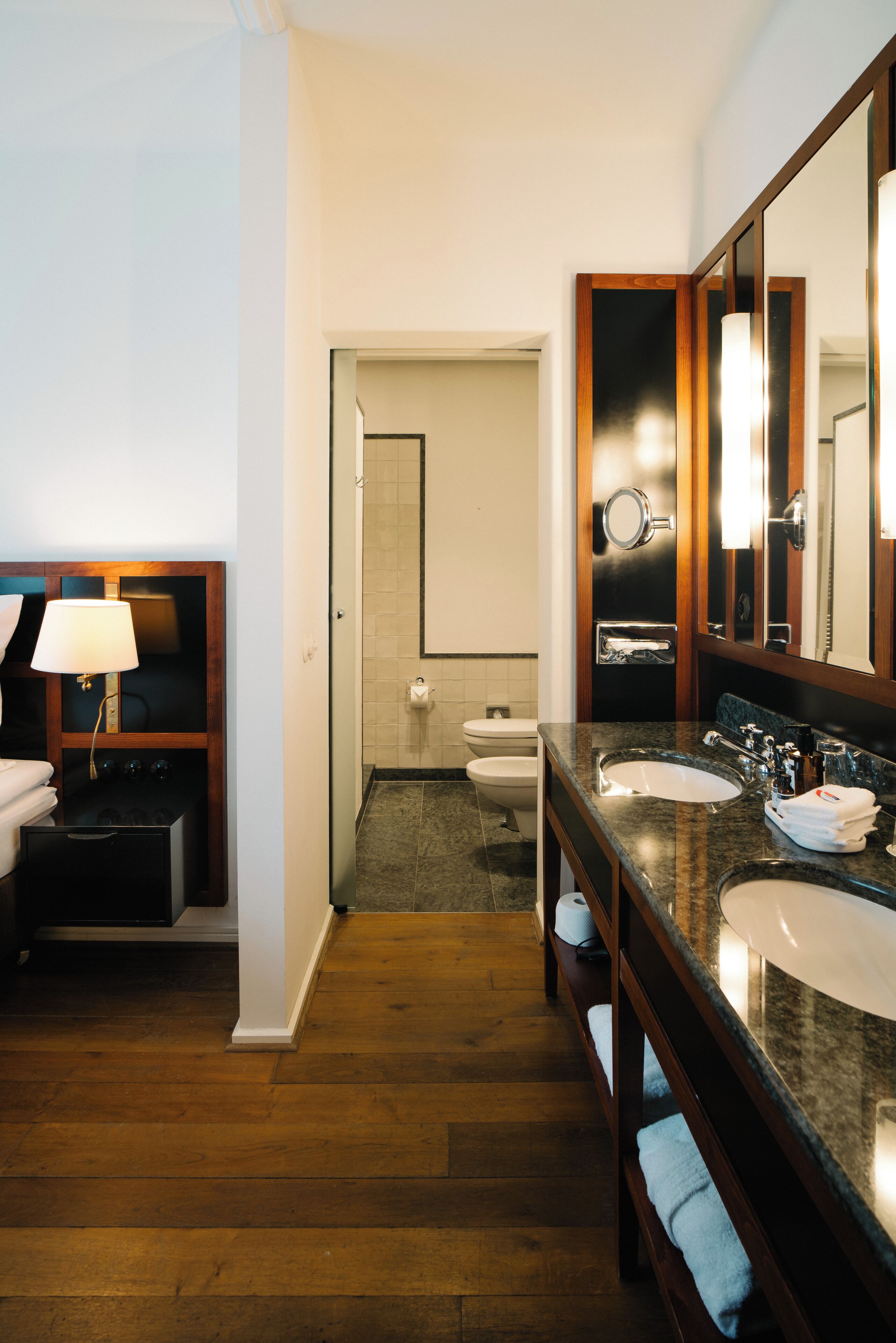 junior suite, 1 bedroom, non smoking, city view | bathroom | hair dryer, bathrobes, slippers, towels