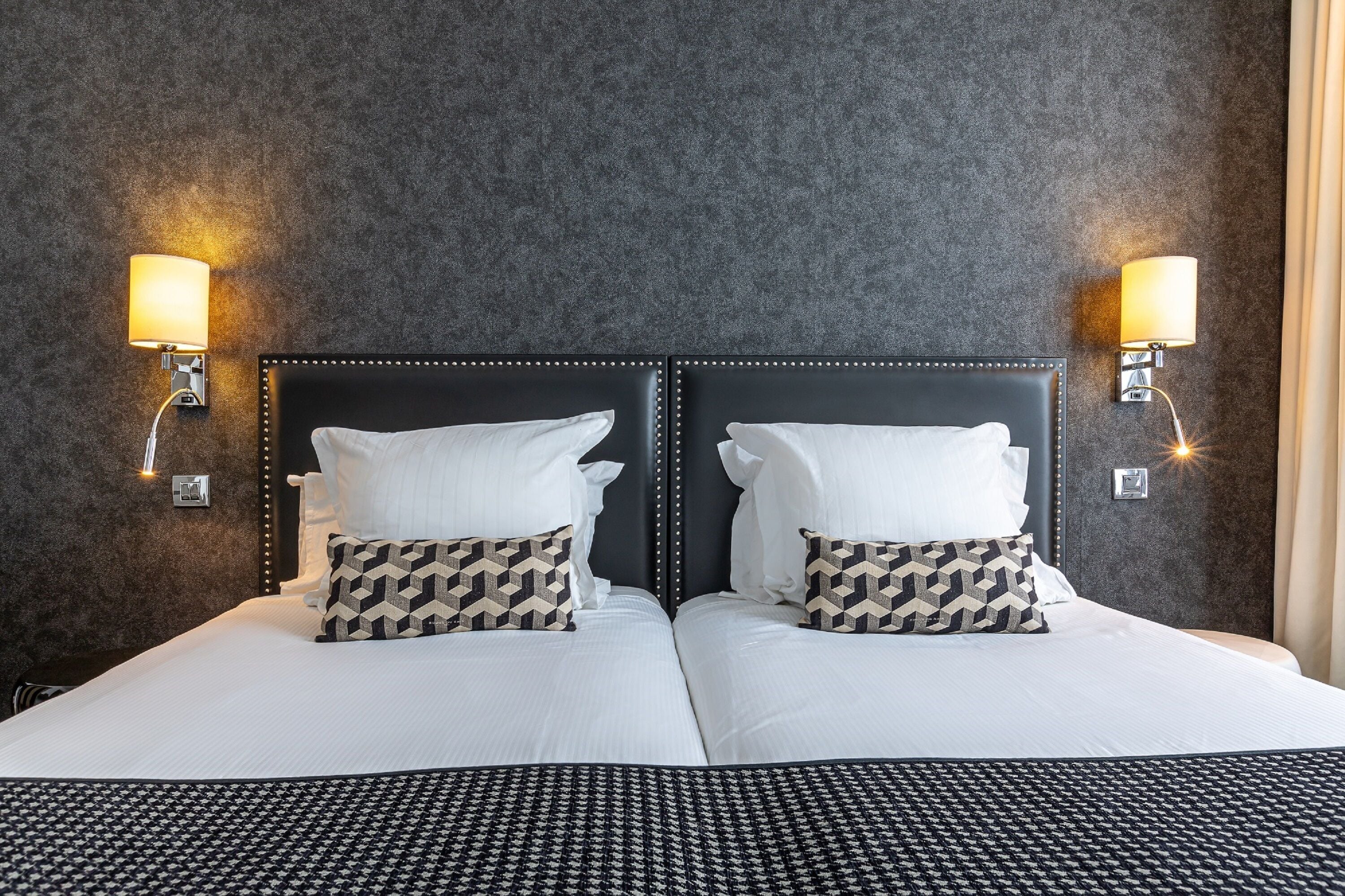 superior twin room | in-room safe, desk, laptop workspace, blackout curtains