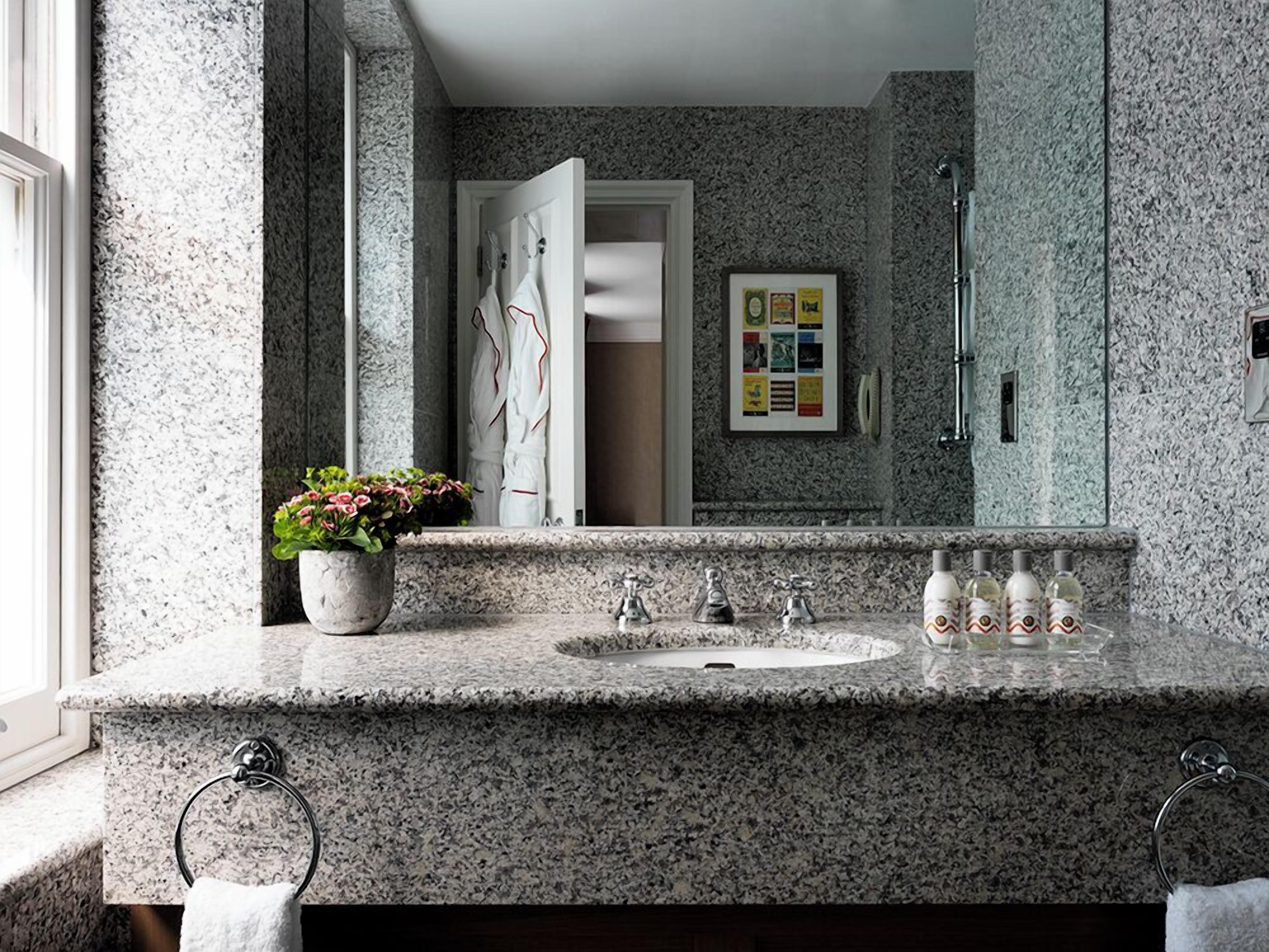 deluxe room | bathroom | designer toiletries, hair dryer, bathrobes, slippers