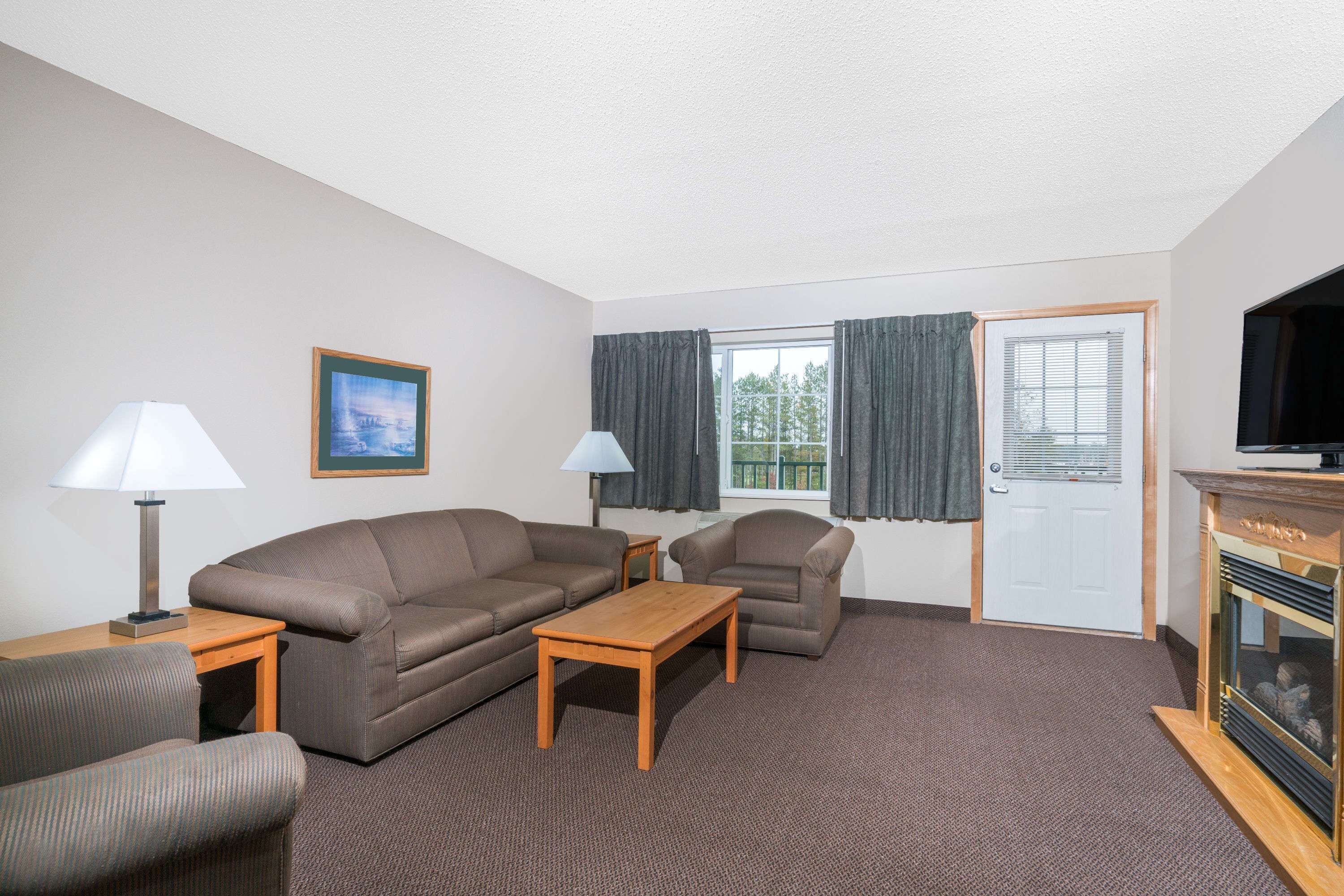 suite, 2 queen beds, non smoking | desk, laptop workspace, blackout curtains, iron/ironing board
