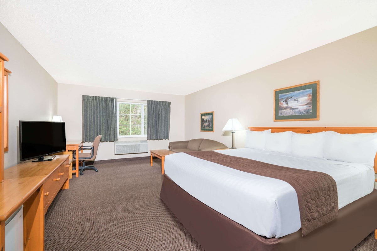 desk, laptop workspace, blackout curtains, iron/ironing board