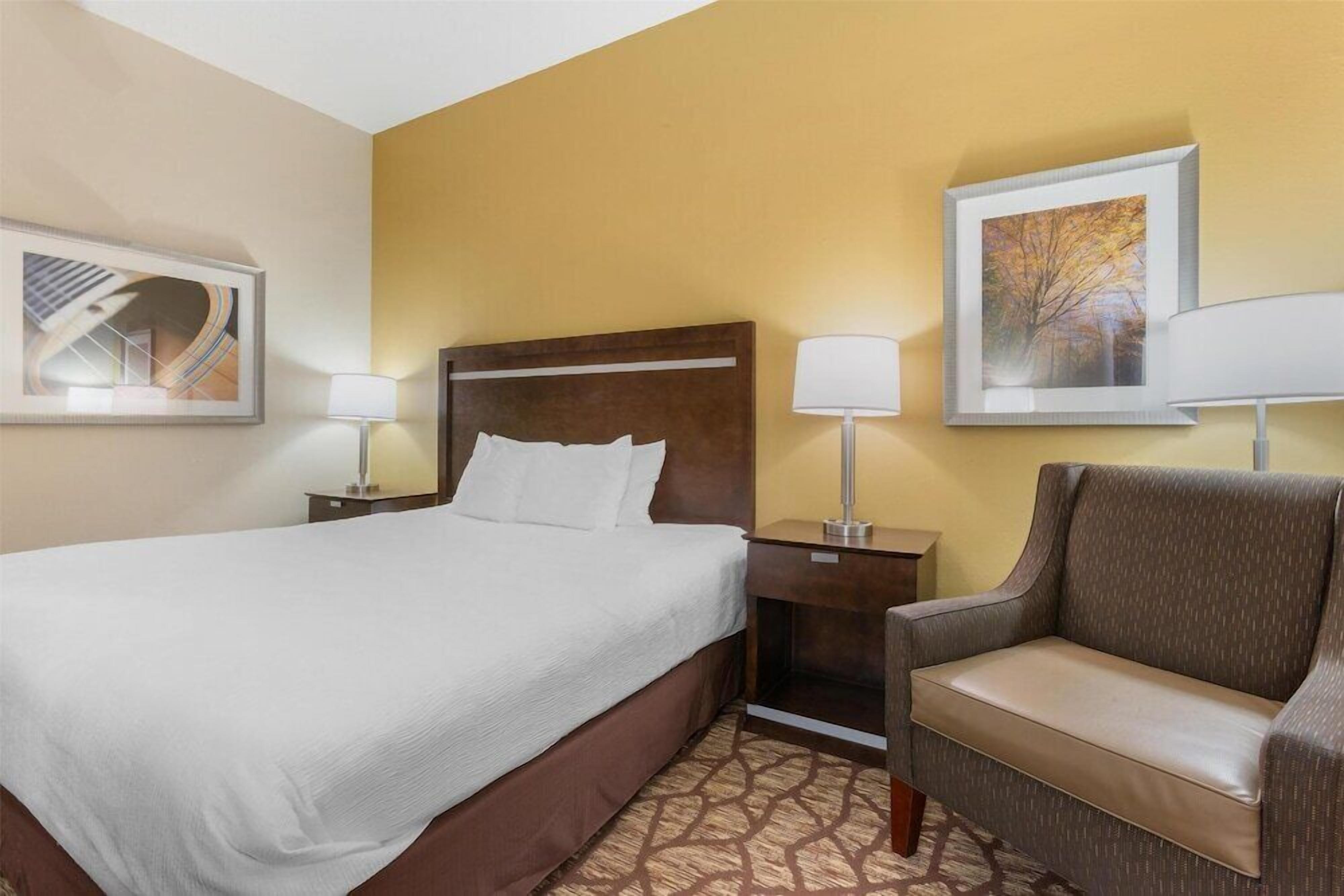 Premium bedding, Select Comfort beds, desk, laptop workspace