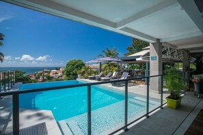 Outdoor pool, open 7:00 AM to 10:00 PM, pool umbrellas, pool loungers