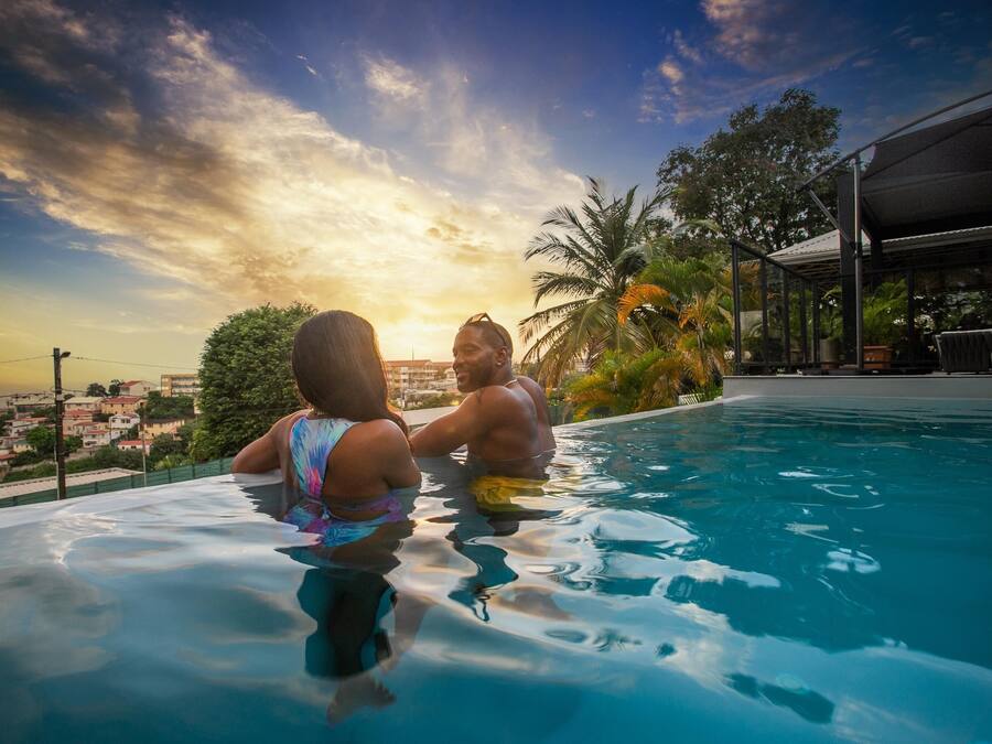 Outdoor pool, open 7:00 AM to 10:00 PM, pool umbrellas, sun loungers