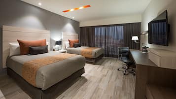 Deluxe Dos Camas | Premium bedding, in-room safe, desk, blackout curtains