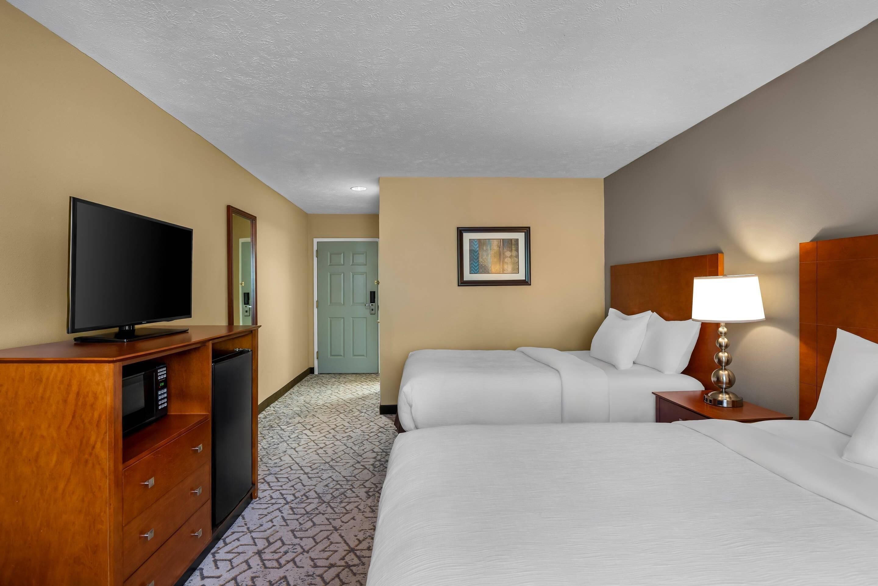 Standard Room, 2 Queen Beds, Non Smoking | In-room safe, desk, iron/ironing board, cribs/infant beds