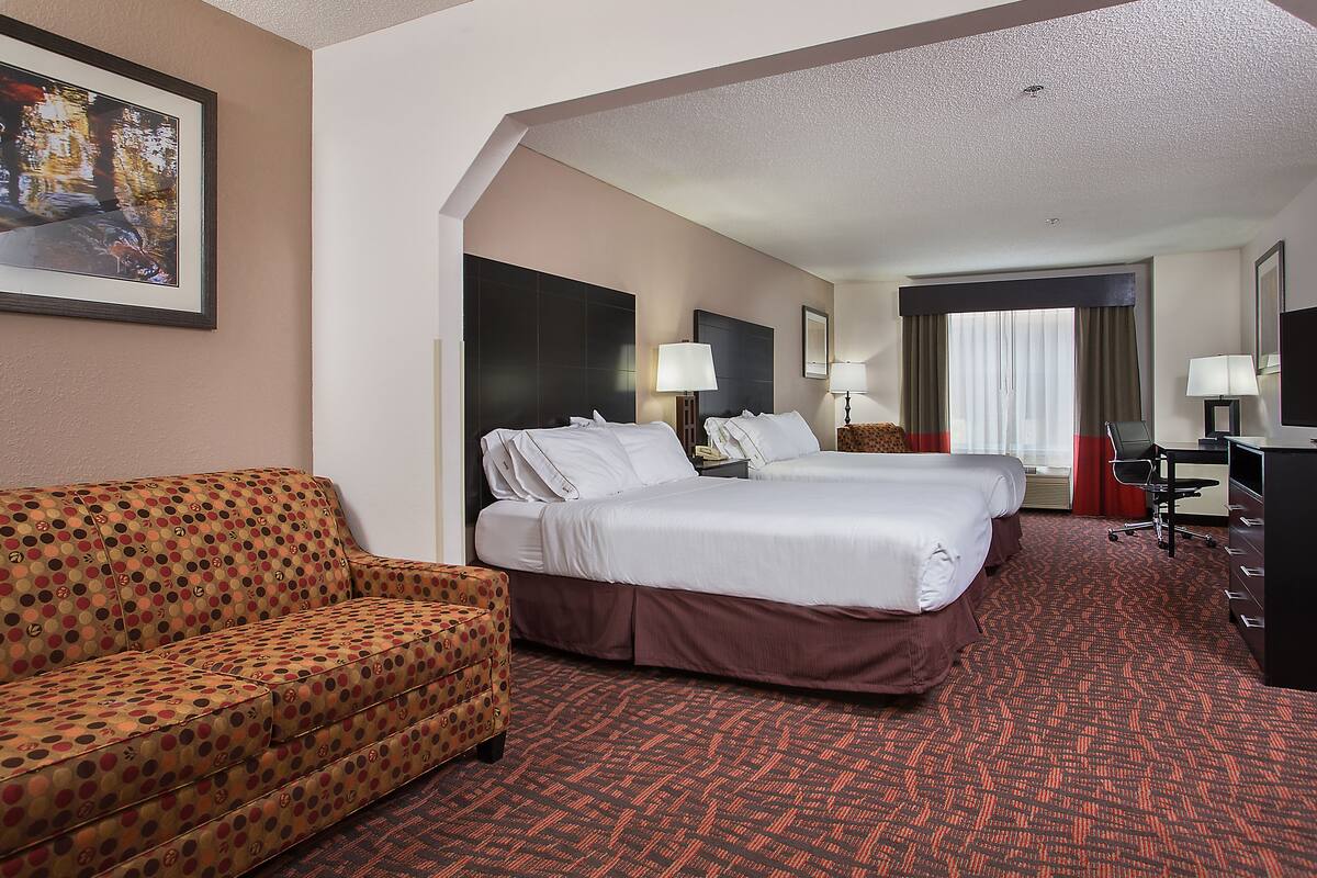 suite, multiple beds | 1 bedroom, desk, iron/ironing board, cots/infant beds